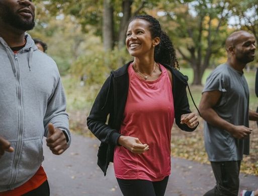 A group of friends going for a run in a park